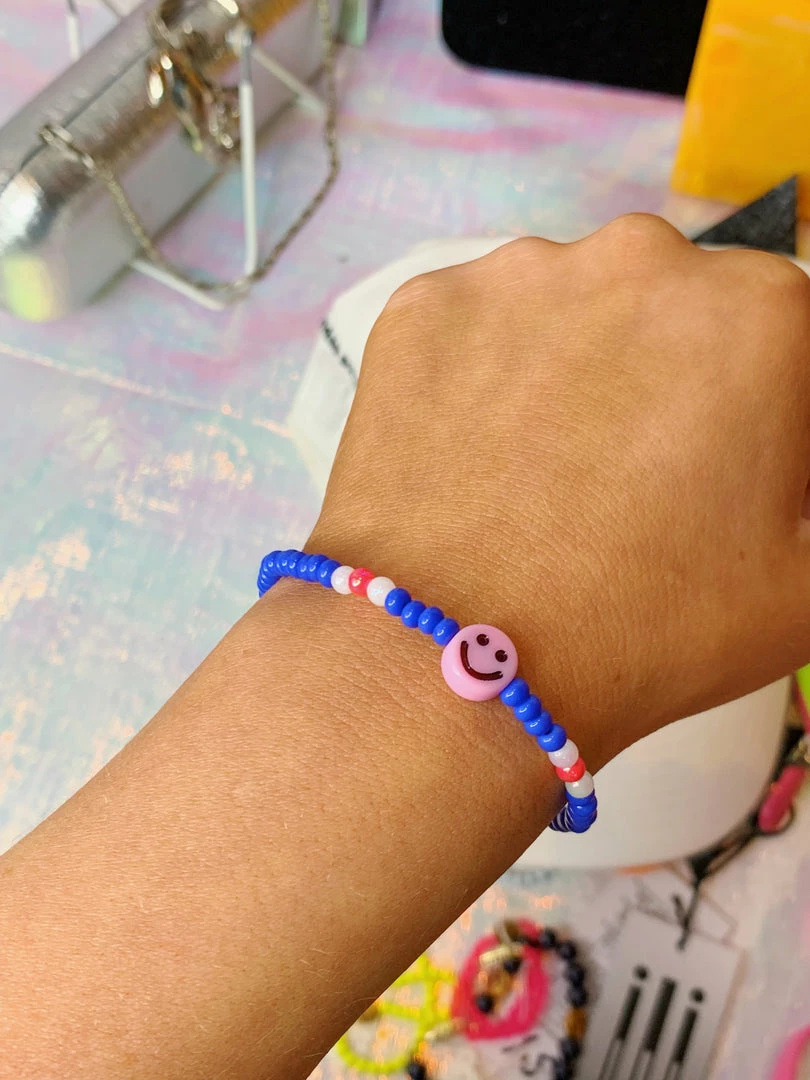 The Spice Girls NEW IN Smiley Kylie Bracelet 1 The Spice Girls NEW IN Smiley Kylie Bracelet